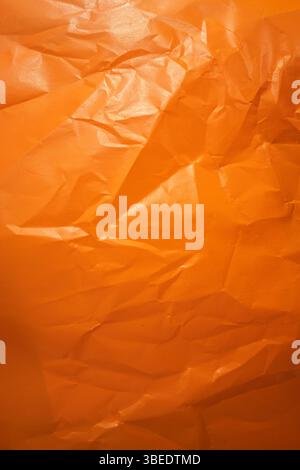 wrinkled red gloss paper texture background. Stock Photo