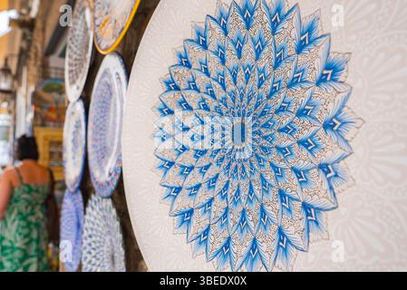 Close Up of Ceramic Plate with Blue and White Floral Design in Ravello Stock Photo