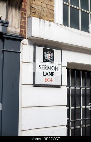 Close-up of the Sermon Lane street sign in the City of London. The sign is marked with EC4 postcode. Stock Photo