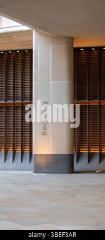 Exterior of the Bloomberg building in London, showcasing modern architectural design. The structure features sleek lines and vertical louvers. Stock Photo