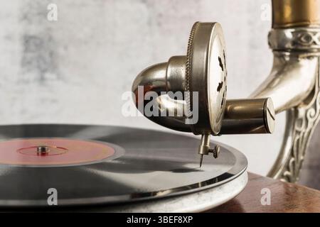 Vintage gramophone with record and a needle close up. Stock Photo