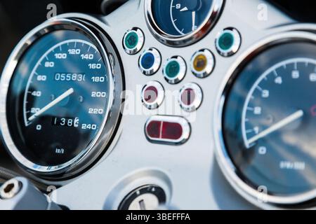 Dashboard of a sports motorcycle, with speedometer and tachometer, close up. Stock Photo