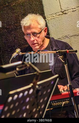 French jazz musician Frédéric Brothier of jazz group TriAdd at electronic keyboard - central France. Stock Photo