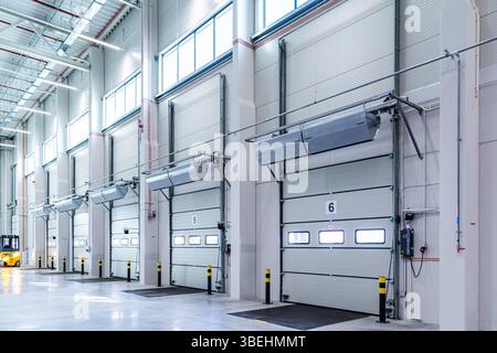 Modern warehouse with industrial loading docks Stock Photo