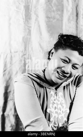 Ella Jane Fitzgerald (April 25, 1917 – June 15, 1996) was an American singer, songwriter and composer, sometimes referred to as the "First Lady of Song", "Queen of Jazz", and "Lady Ella". She was noted for her purity of tone, impeccable diction, phrasing, timing, intonation, absolute pitch, and a "horn-like" improvisational ability. Stock Photo
