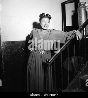 Portrait of Ella Fitzgerald by William Gottlieb, New York, Nov. 1946. Ella Jane Fitzgerald (April 25, 1917 – June 15, 1996) was an American singer, songwriter and composer, sometimes referred to as the "First Lady of Song", "Queen of Jazz", and "Lady Ella". She was noted for her purity of tone, impeccable diction, phrasing, timing, intonation, absolute pitch, and a "horn-like" improvisational ability. Stock Photo