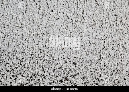 White coarse concrete stucco wall abstract textured background Stock Photo