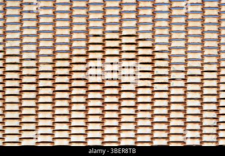Weathered rusty expanded metal mesh abstract texture background Stock Photo