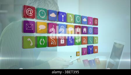 Image of colourful icons over caucasian woman using laptop Stock Photo