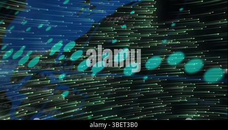 Image of graphs and green lights moving on black background Stock Photo