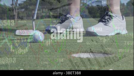 Image of statistical and financial data processing over mid section of a man playing golf Stock Photo