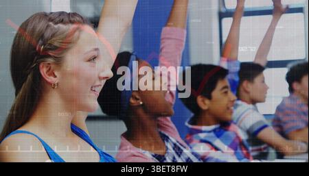 Image of graph over class of happy diverse pupils during lessons Stock Photo