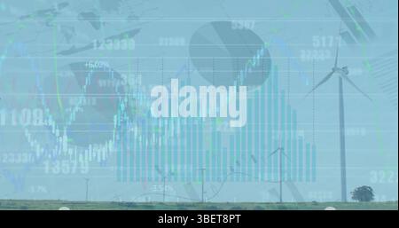 Image of financial data and graphs over landscape with wind turbines Stock Photo
