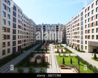A Modern Residential Complex Featuring Expansive Green Spaces and ...