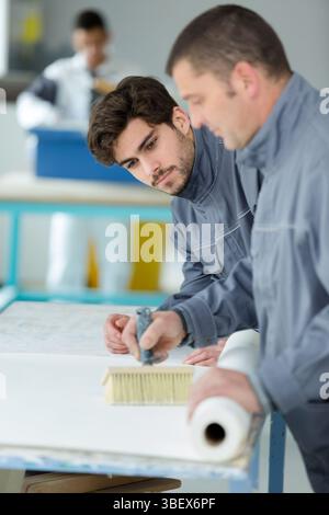 portrait of painter with apprentice Stock Photo