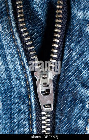 Detailed View of Jeans Zipper and Denim Fabric. Stock Photo