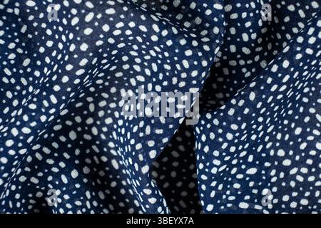 Macro Texture Polyester Blue Fabric Polka Dot Pattern. Stock Photo