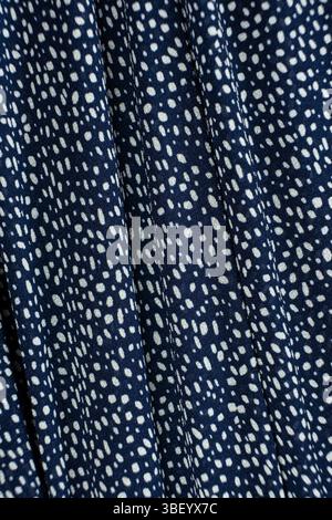 Blue Polyester Fabric with White Spots Stock Photo