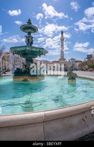 View of North fountain of Rossio in Praca do Rossio on a sunny day in Lisbon city centre, Lisbon, Portugal, Europe Stock Photo