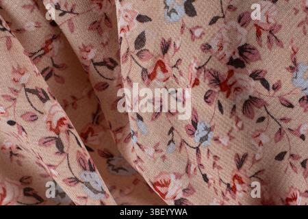 Fashion Fabric Macro Texture with Floral Pattern on Polyester. Stock Photo