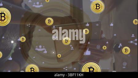 Image of bitcoins and social media icons over midsection of businesspeople using tablet Stock Photo