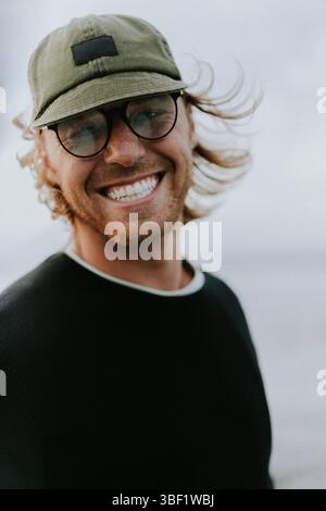 Close-up portrait of a man in glasses and a cap Stock Photo