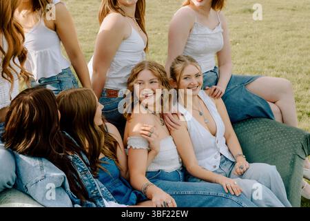 Group of university students smiling and enjoying time together Stock Photo