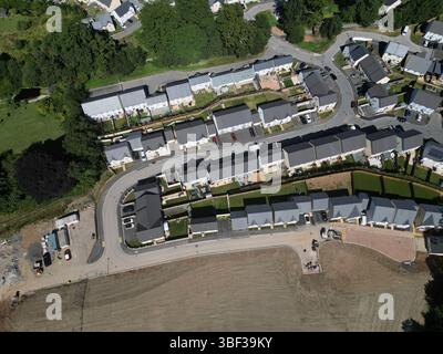 Newton Abbot, South Devon, England: DRONE VIEW: New build houses on green belt land in the village of Highweek on the outskirts of Newton Abbot (1). Stock Photo