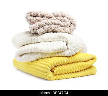 Stack of folded blankets isolated on white Stock Photo