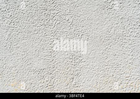Gray stucco on wall of house. Construction industry Stock Photo