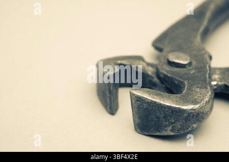 Tools for pulling nails - old metal pliers Stock Photo