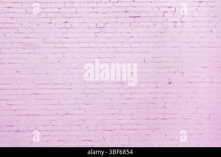 Pink brick wall. Loft interior design. Pink paint of the facade. Architectural background Stock Photo
