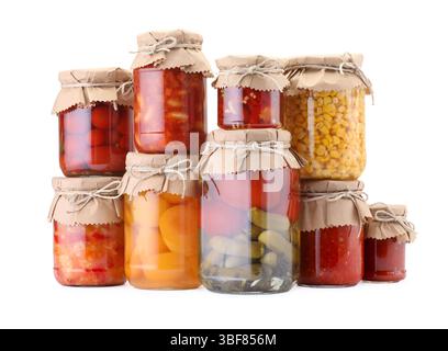 Many jars with different pickled products isolated on white Stock Photo
