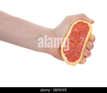 Woman squeezing grapefruit on white background, closeup Stock Photo