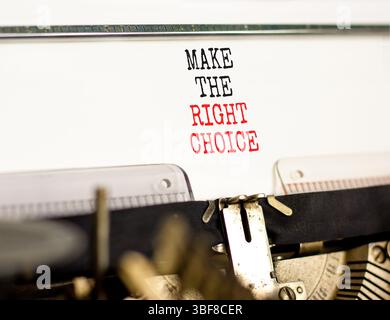 Make the right choice symbol. Concept words phrase Make the right choice typed on beautiful retro old typewriter. Beautiful white background. Business Stock Photo