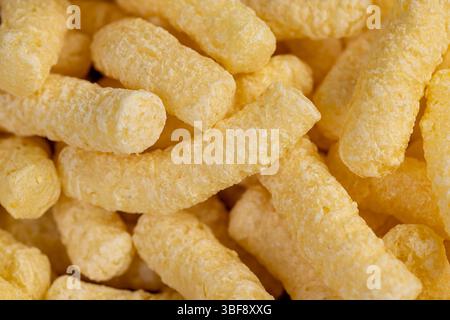 corn sticks made from flour, a large number of ready-made corn sticks for eating or making breakfast with milk, closeup Stock Photo
