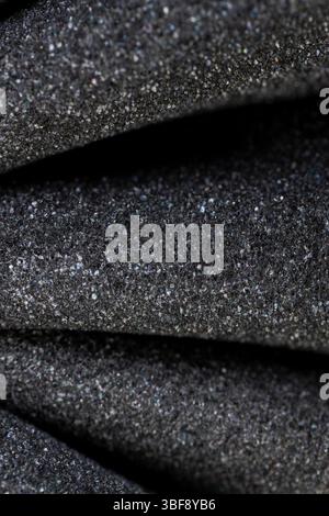 foam for packaging of objects and products, foamy soft foam for giving elasticity to objects or sound insulation or as a packaging material, closeup Stock Photo