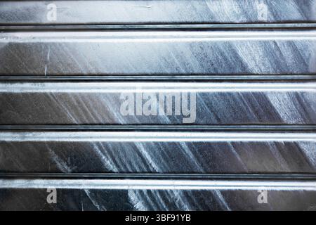 New galvanized steel profile box close-up. Shiny drawer texture. Stock Photo
