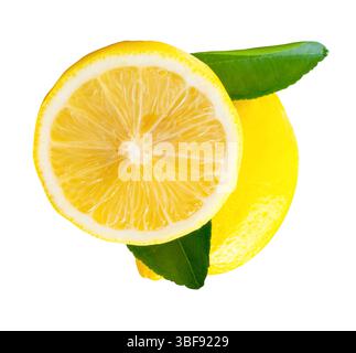Top view of yellow lemon fruit with half and green leaves is isolated on white background with clipping path. Stock Photo
