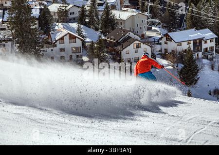 skier on a rapid descent in Switzerland Stock Photo