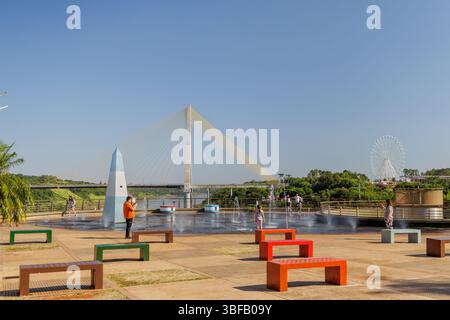 Puerto Iguazu, Misiones, Argentina - May 18th, 2025: Tourists in the Three Borders Landmark. Stock Photo
