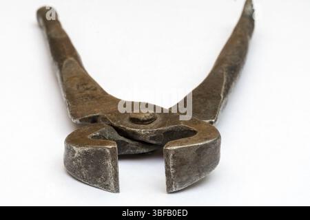 Tools for pulling nails - old metal pliers Stock Photo