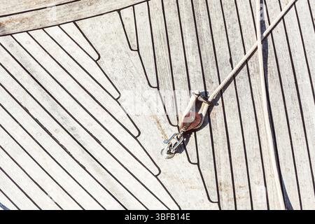Boat deck with wooden texture and rope detail, abstract pattern background Stock Photo