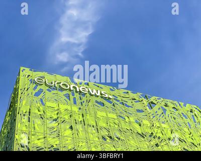 Euronews, european pay television news network brand logo on its headquarter office building located in eco-district Confluence. Mobile photography. L Stock Photo