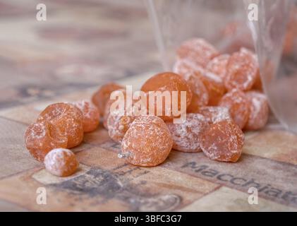 Kumquat-dried tangerines scattered on the table, selective focus Stock Photo
