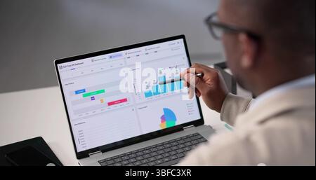 Analyzing Business Data Using Digital Dashboard For Remote Financial Consulting. Stock Photo