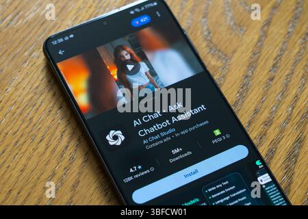 Install screen showing Ai Chat - Ask Chatbot Assistant app by AI Chat Studio, on a smartphone screen, UK. A competitor to the Chat GPT application Stock Photo