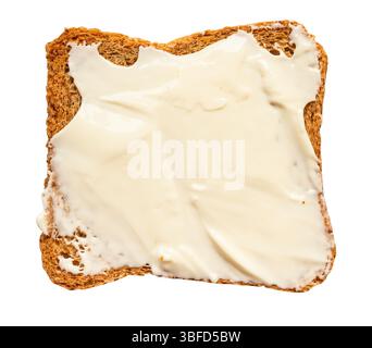 bread rusk with butter spread on it cutout on white background Stock Photo
