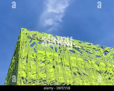 Euronews, european pay television news network brand logo on its headquarter office building located in eco-district Confluence. Mobile photography. L Stock Photo