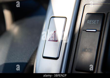 Close up of car emergency button. Car alarm button. Automobile safety. Stock Photo